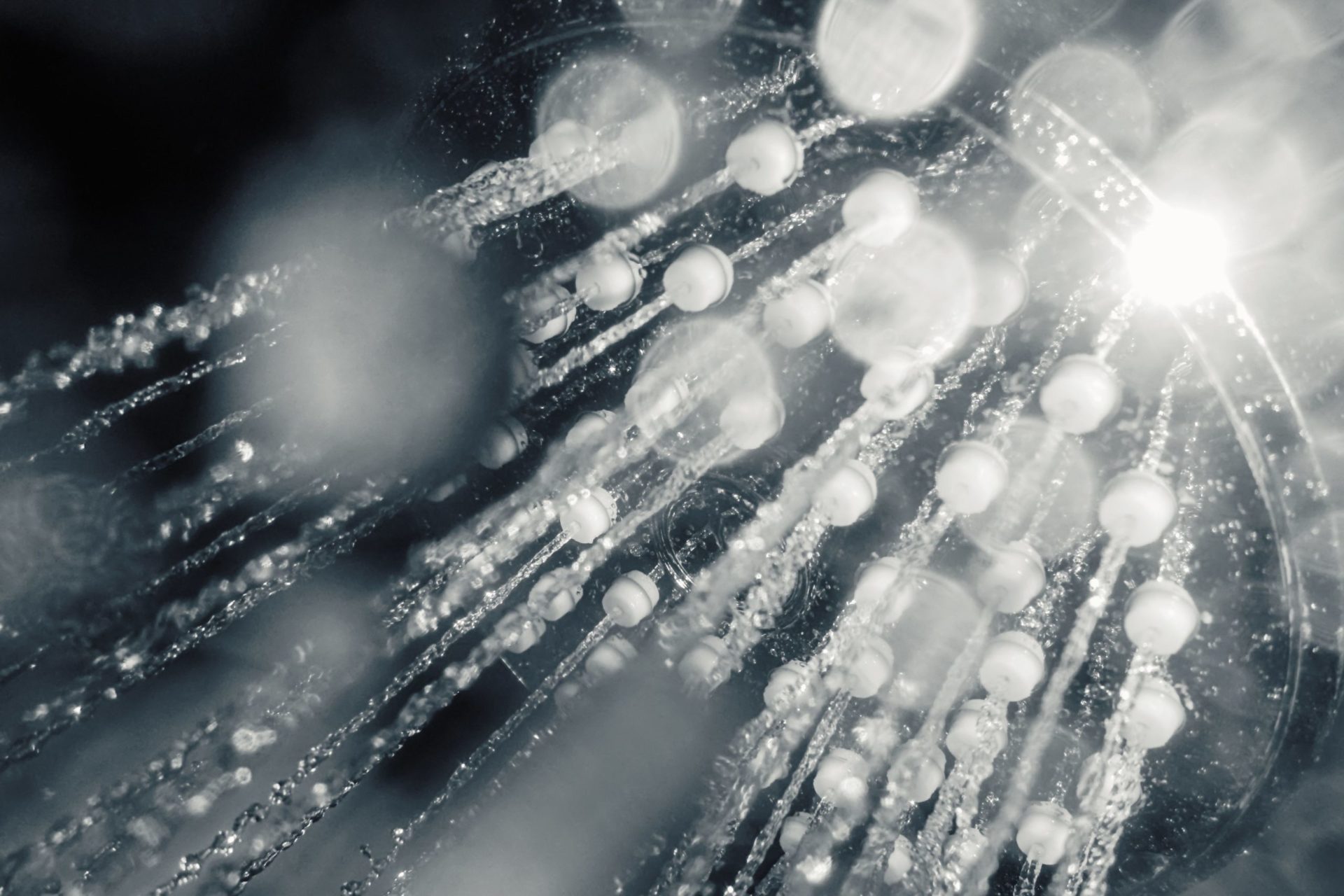 Sparkling water droplets. Bokeh effect in the background.